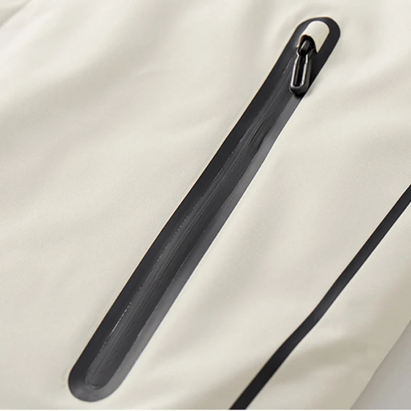Veste Imperméable pour Femmes - Capuche Détachable et Poches Zippées