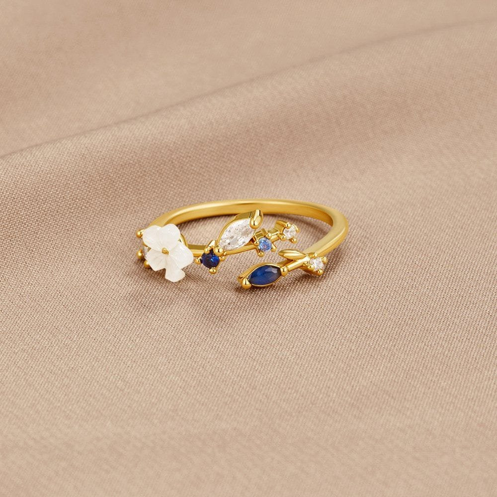 Bague fleurie cristal blanc et bleu éclatant