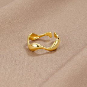 Bague vague dorée élégante soleil
