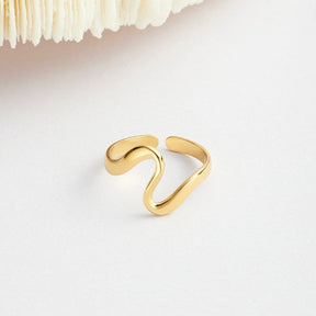 Bague vague dorée moderne topaze