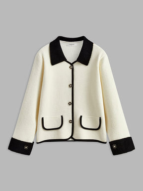 Blazer bicolore élégant en tricot blanc et noir harmonie
