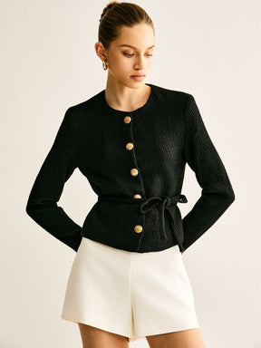 Blazer noir ceinturé détail boutonnage doré pluie