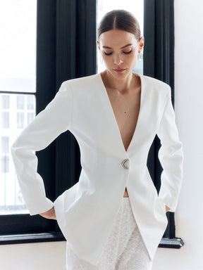 Blazer blanc élégant col V profond cristal