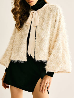 Blazer duveteux beige avec nœud délicat