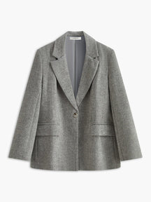 Blazer élégant gris motif chevron doux