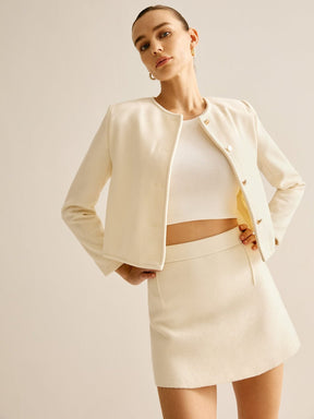 Blazer tweed élégant col rond vue détaillée grâce