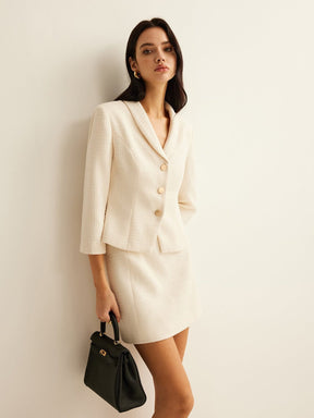 Blazer tweed beige élégant vue boutonnage style