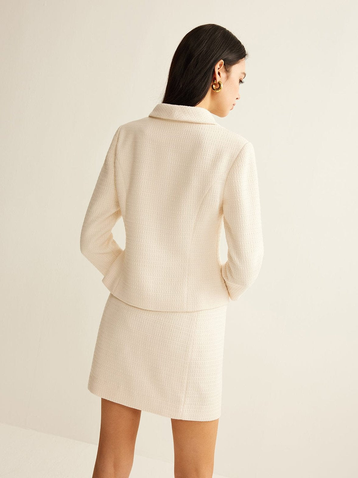 Blazer tweed beige élégant vue manche élégance