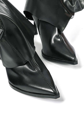 Vue arrière des bottes en cuir noir lune