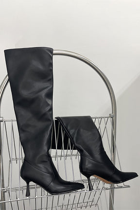 Bottes hautes noires sophistiquées harmonie