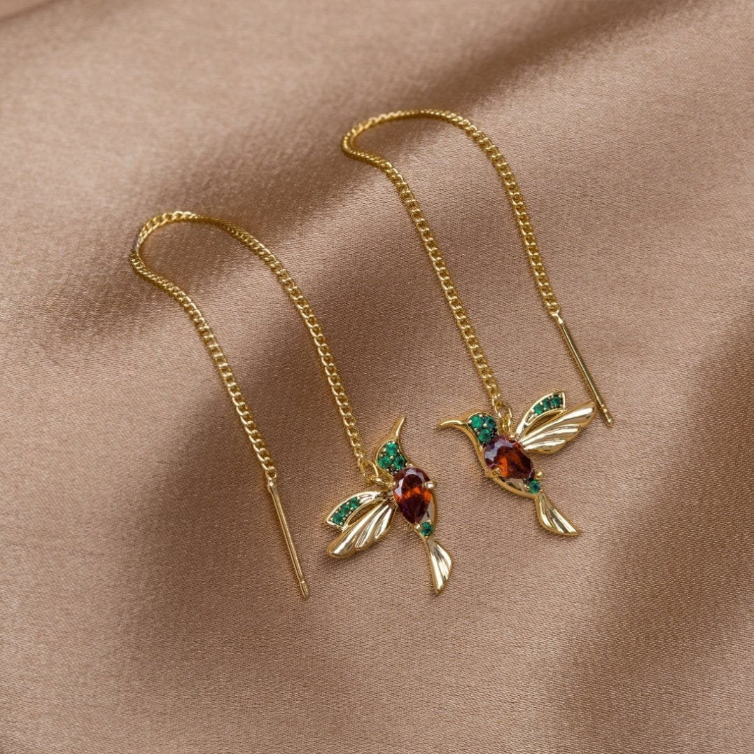 Boucles d'oreilles colibri en cristal dorées étoile