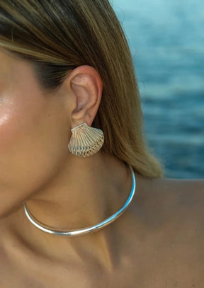 Boucle d'oreille coquillage élégante vague