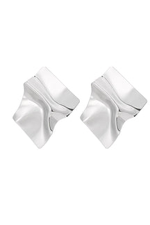 Boucles d'oreilles statement dorées texturées étoile