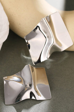 Boucles d'oreilles design contemporain doré lune