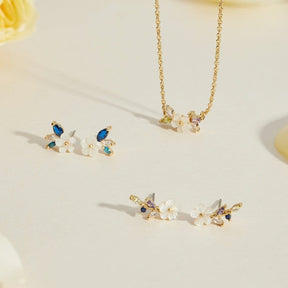 Boucles d'oreilles fleur cristal blanc vue profil nuage