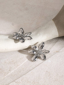 Boucle d'oreille fleur luxueuse océan