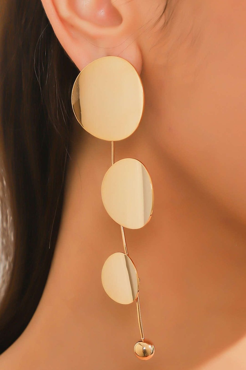 Boucles d'oreilles dorées minimalistes cercles superposés étoile