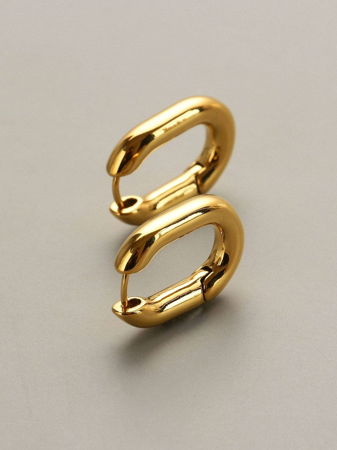 Boucles d'oreilles design moderne plaqué or harmonie