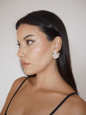 Boucles d'oreilles rose argentées vue portée cristal
