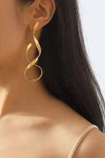 Boucles d'oreilles spirale dorées élégantes whisper
