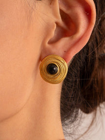 Boucles d'oreilles dorées onyx vue face soleil