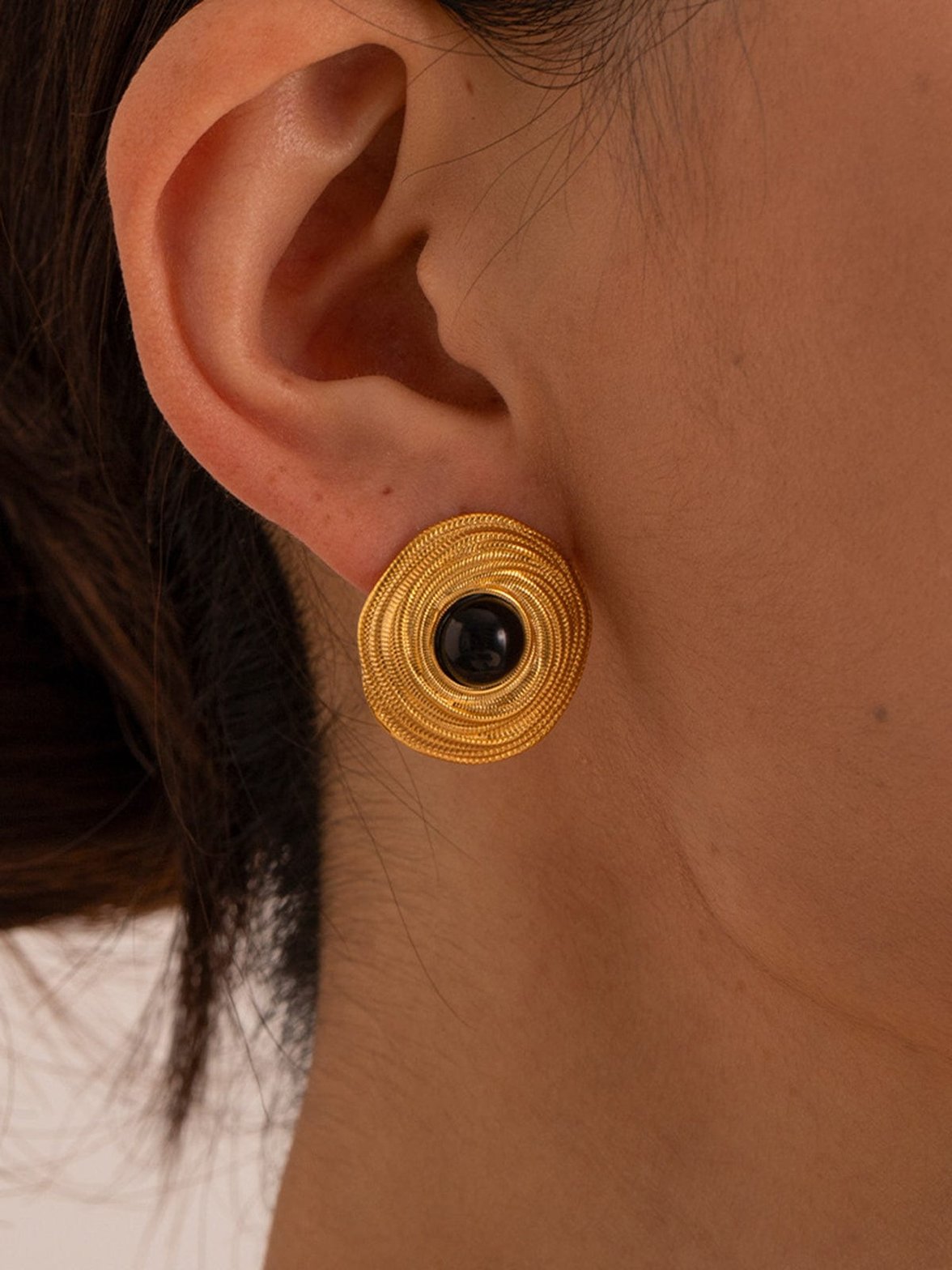 Boucles d'oreilles dorées onyx vue détaillée étoile