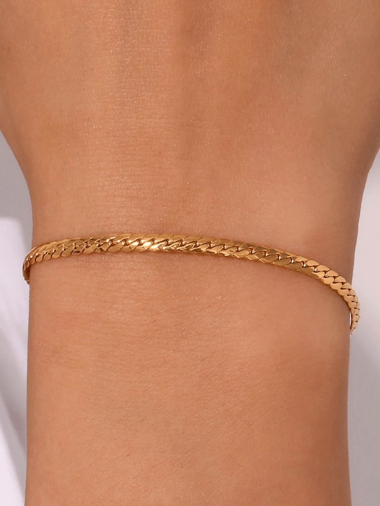 Bracelet chaîne serpent doré détail harmonie