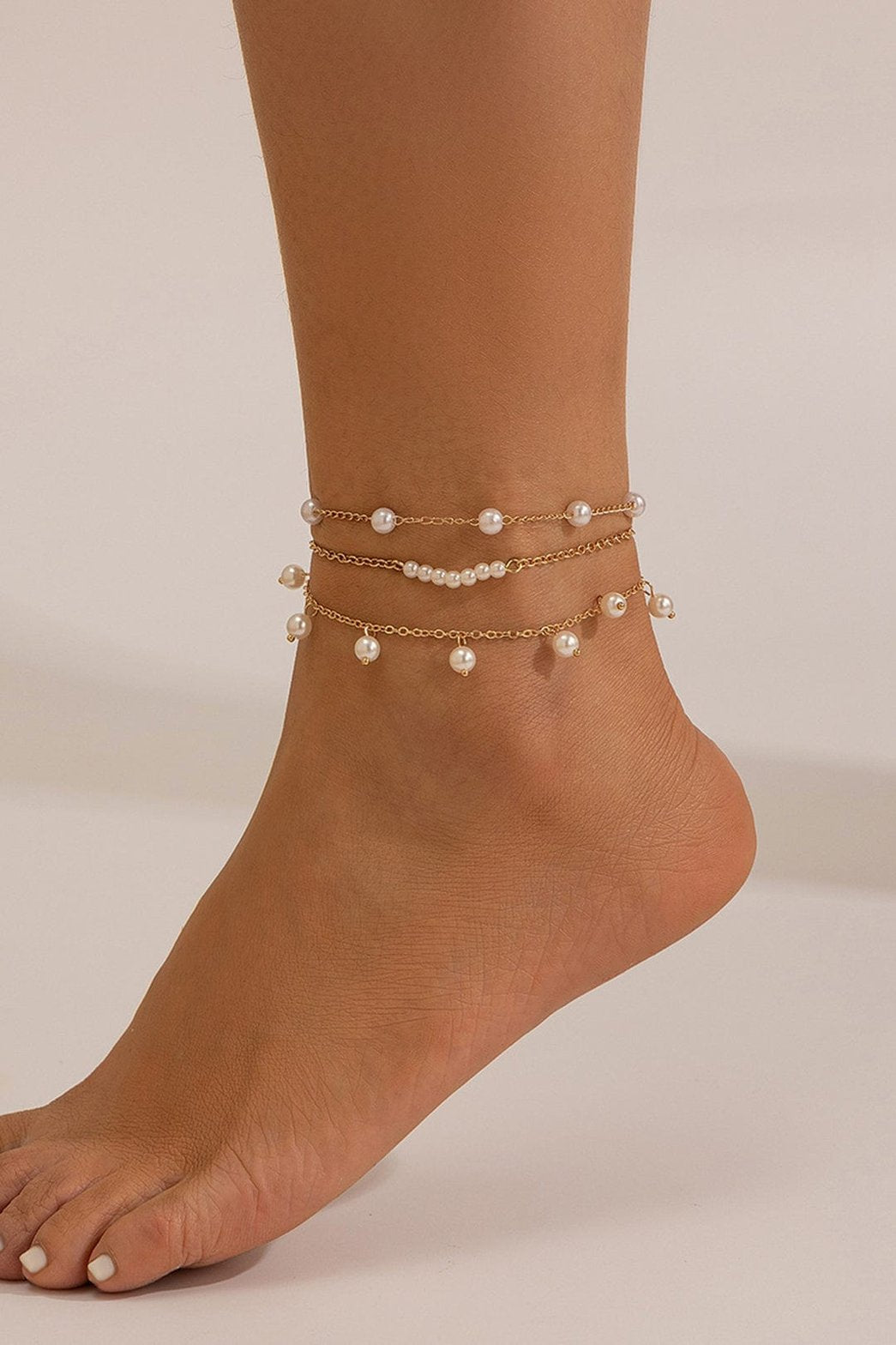 Détail des perles sur bracelet de cheville étoile