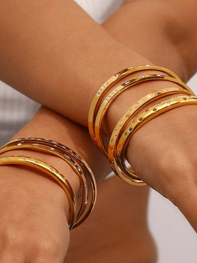 Bracelet jonc doré avec motifs étoilés étincelant