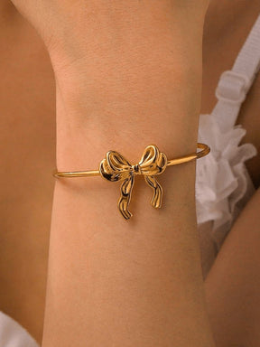 Bracelet jonc doré nœud papillon élégant coquet