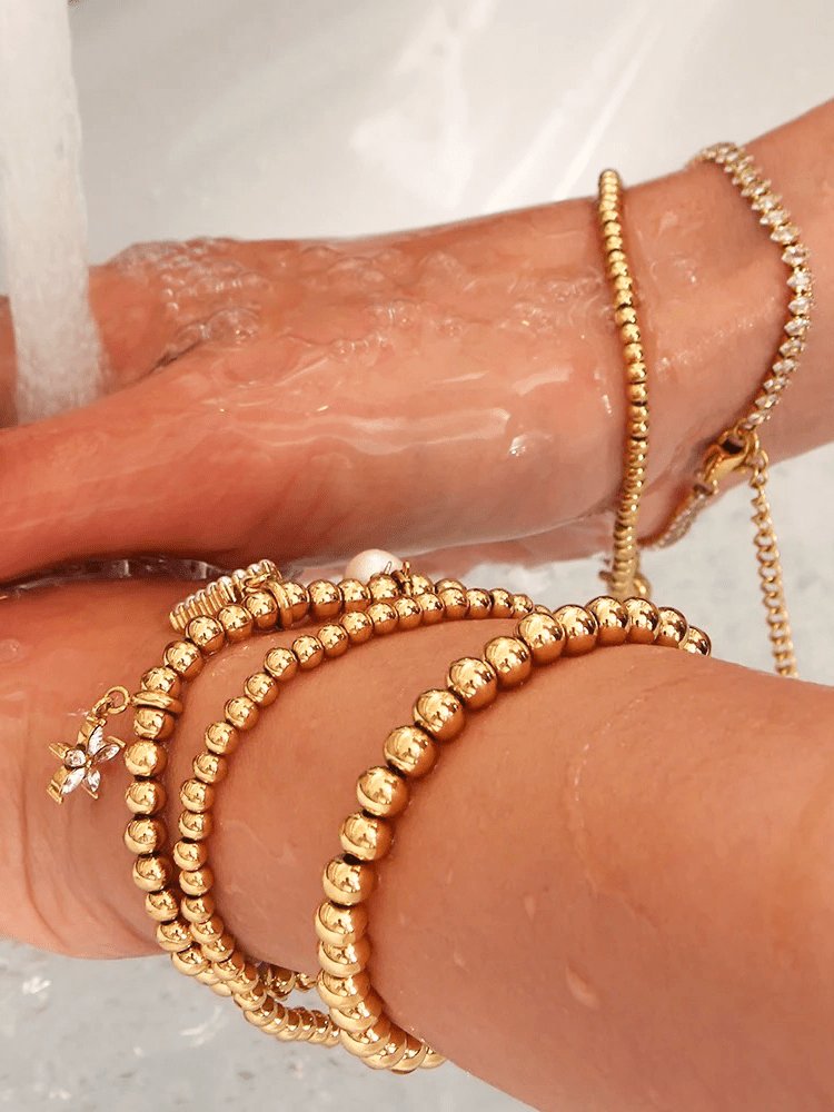 Bracelet perles dorées élégant lumière