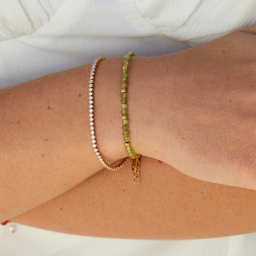 Bracelet tennis doré vue rapprochée rose
