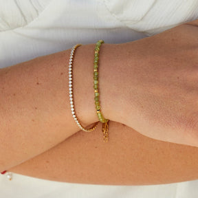 Bracelet tennis doré vue rapprochée rose