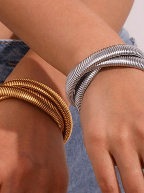 Bracelet serpentin or porté crystal