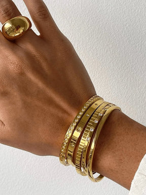 Bracelet doré avec zirconias étincelant merveille