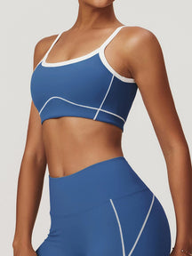 Brassière de sport bleue avec bordures blanches étoile