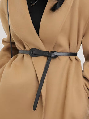 Ceinture fine en cuir noir avec boucle élégante soleil
