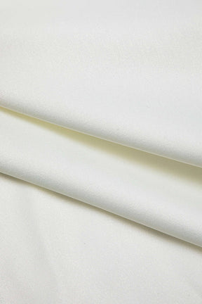 Chemisier blanc twist porté élégance