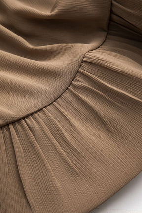 Chemisier plissé beige vue côté charme