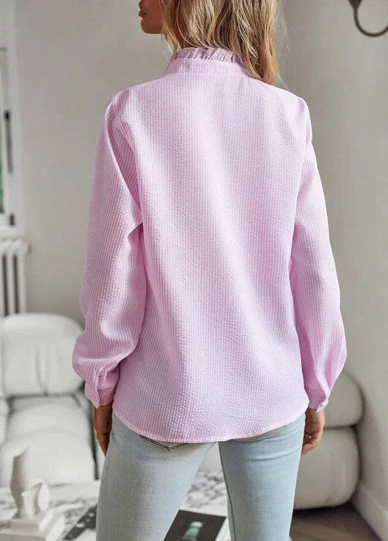 Chemisier blanc manchettes boutons perle