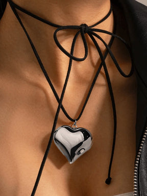 Collier cœur argenté avec cordon noir douceur
