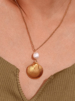 Collier coquillage doré avec perle nacrée soleil
