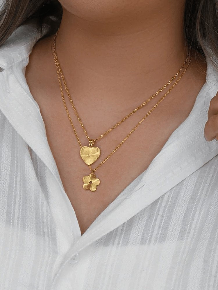 Collier double rang doré avec pendentif fleur étincelant doux