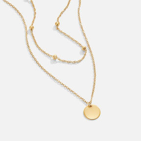 Collier double rang doré médaillon élégant