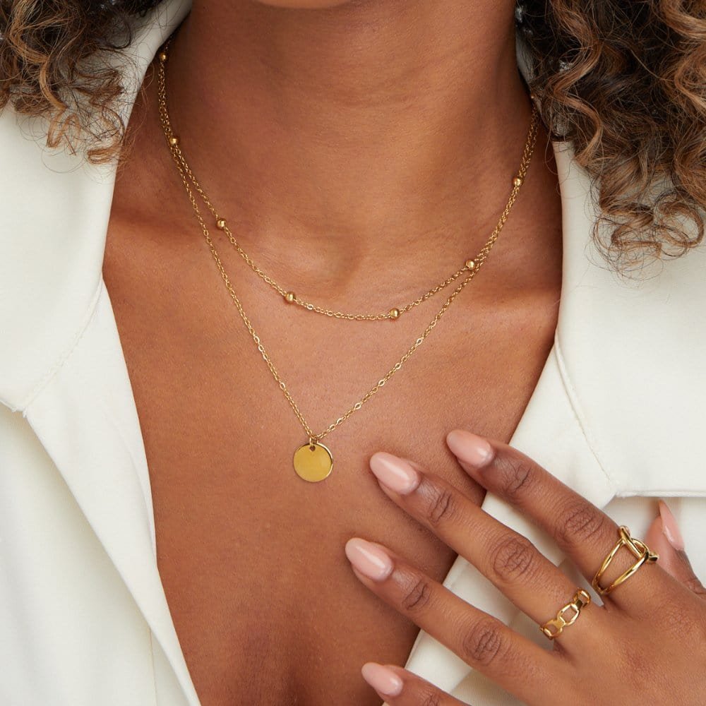 Collier superposé doré sophistiqué