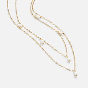 Vue rapprochée du collier multicouche grâce