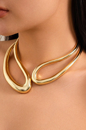 Collier sculptural doré grâce