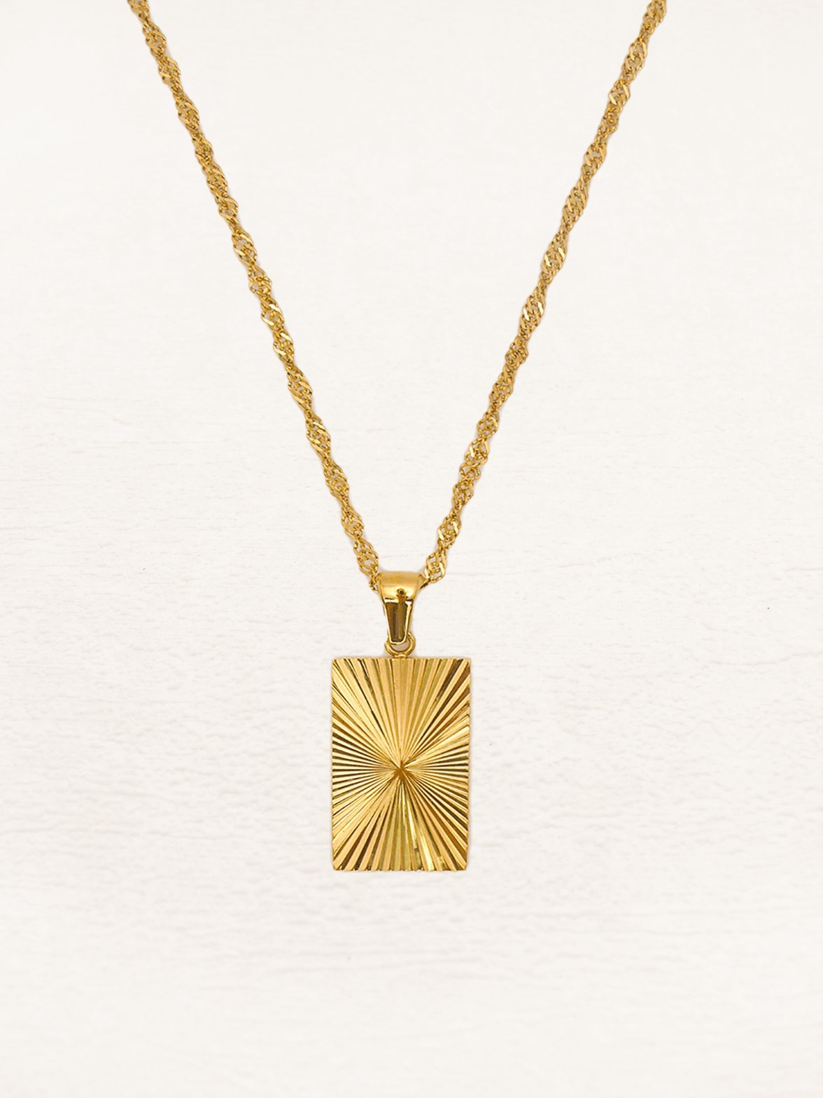 Pendentif géométrique doré brillant étoile