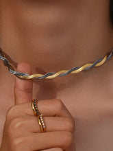 Collier serpent tressé or et argent brillant