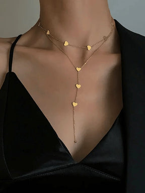 Collier superposé à cœurs dorés brillant